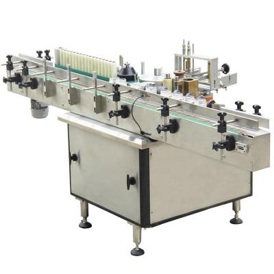 China beverage cold glue/wet glue labeling machine with paper labels for round bottles cans jars for sale