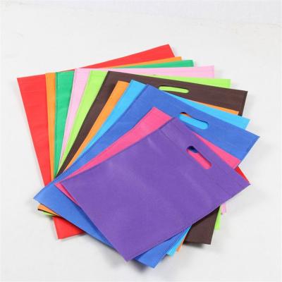 China PUNCH 60gsm custom die cut shopping bag non woven pp nonwoven carry gift bag with logo for sale