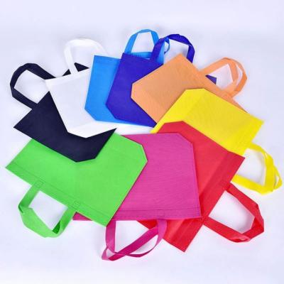 China Handled reusable eco pp non woven bags flat die cut non woven fabric shopping bags 50gsm 60gsm for sale