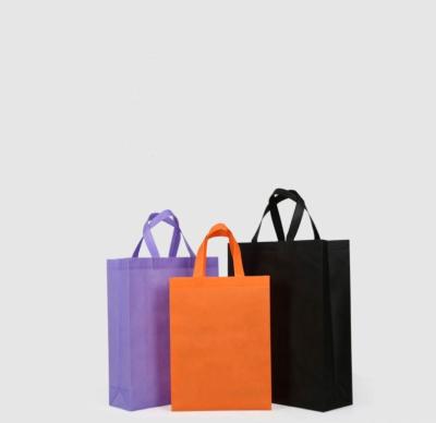 China Eco-friendly Recyclable Recyclable Waterproof Durable Goods Plastic Non-woven T-shirt Bag Handle Nonwoven Shopping Bag With High Quality for sale