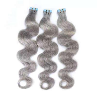 China Wholesale Price 100% Hair Soft Smooth Russian Body Wave Gray Color Tape Hair Extension for sale