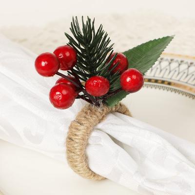 China Viable Artificial Plastic Pinecone Napkin Ring with Mini Berries Pine Cone Pine Needle Leaves for Christmas Home Party Decor for sale