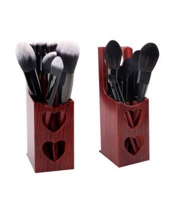 China Angular Blush Wholesale cosmetics high quality plastic handle foundation brush with stand box 10 pieces brushes makeup customization for sale