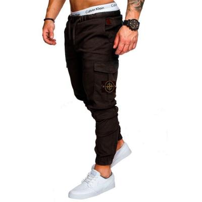 China Other Wholesale Men's Casual Solid Color Sports Pants Cotton Fitness Joggers Pockets Cargo Pants for sale