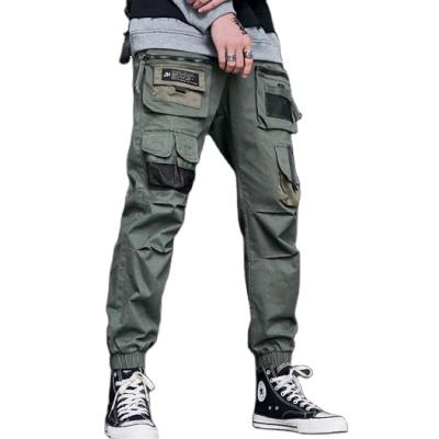 China Anti-Wrinkle Pocket Casual Cargo Pants For Men's Latest OEM High Quality Men's Fashion Pants Workout Pants Drawstring 2022 for sale