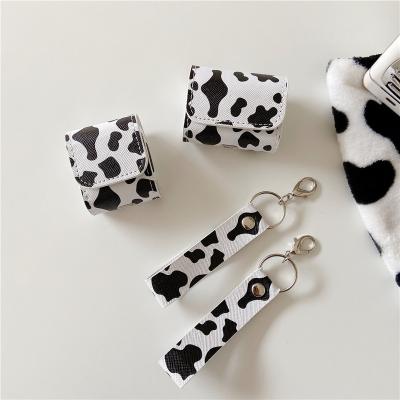 China For Creative Designer Earphone Dairy Cow Pattern Brand Handbag Purse Shape Case For AirPods 1 2 pro with Strap Lanyard for sale