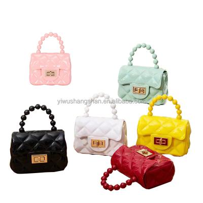 China Hot Sale Waterproof Kids Mini Jelly Bags Summer Shiny PVC Cross - Body Bags For Babies Small Solid Multi Color Purse Pearl Purse for sale