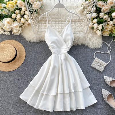 China 2022 Sexy V-Neck Anti-Static Beach Resort Dress Halter Lace Up Double Ruched Fluffy Dress Dress for sale