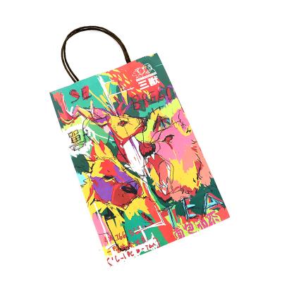 China Recycled materials printing anime paper bags personality street paper bag with handle for sale