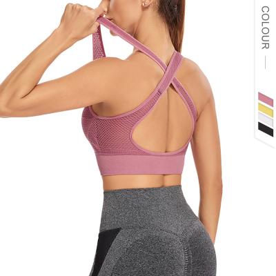 China New arrival breathable custom cheap sports bra for women cross back wear sports yoga fitness mesh gym apparel yoga bra top wholesale for sale