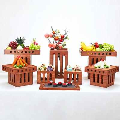 China Sapele Wood Buffet Food Bread Display Rack Cake Dessert Sushi Supply Display Stand for sale