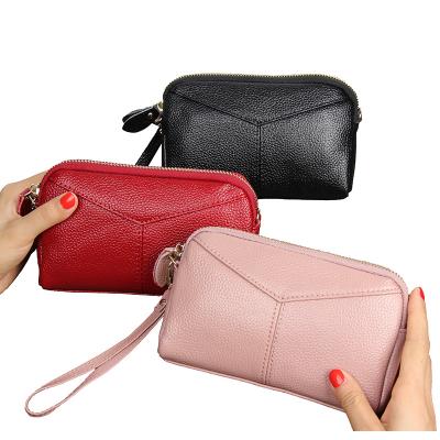 China RFID Clutch Wallet RFID Blocking Large Capacity Clutch Purse Leather Women Wallet Along With Wrist Strap for sale