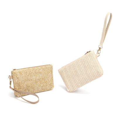 China Latest Women Straw Clutch Purse Mobile Phone Bag Waterproof Woven Beach Bag Rattan Purse Wallet With Wrist Strap for sale