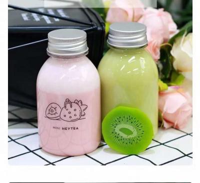 China Disposable Plastic PET Material Juice Bottle Disposable Cold Pressed Beverage Bottle For Drinking for sale