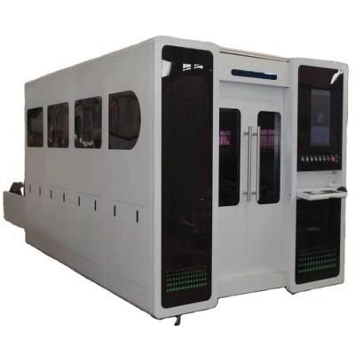 China Laser CUTTING Wholecover High Density Fiber Laser Cutting Machine 1000w For Metal Cutting for sale