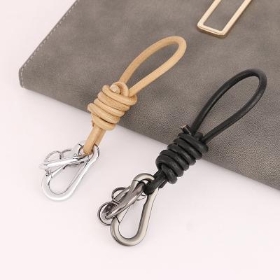 China Customized wholesale custom logo customized string type genuine leather key chain for promotion gift key chain for sale