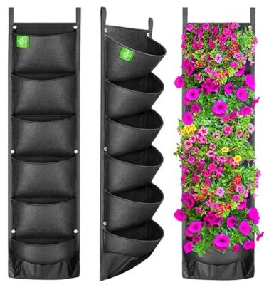 China 100% New Eco-Friendly Upgraded Large 7 Pockets Garden Wall Hanging Vertical Planters Grow Bags For Plant Indoor Outdoor Hang for sale