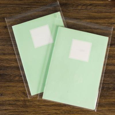 China Self Adhesive Cell Phone Case And Notebook Plastic Bags Recyclable Clear Poly RM OPP Bags for sale