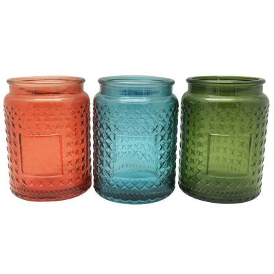 China Tall Unique Traditional Embossed Glass Jar Candle 17oz Glass Jars With Metal Lids 18oz HAODEXIN Candle Holders Screw Cap Stars Facets for sale