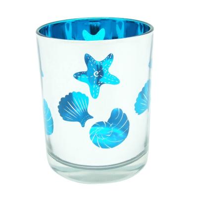 China Fancy 6.5oz Outer Candle Jars Ocean Blue Glass Laser Cut Silver Inner Tea Light Candle Holders HAODEXIN for sale