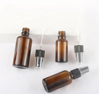 China Personal Care Ready To Ship 50ml 30ml 100ml Tincture Glass Bottle Personal Care Amber Industrial Use With Black White Plastic Mist Sprayer for sale