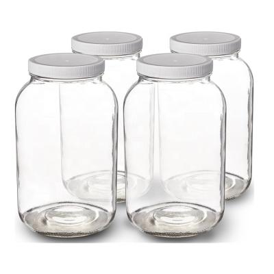 China Food 4L Big Sale 1 Gallon Jar Home Glass Pickles Container Stash Body Hot Soft Round Cereals Storage With Plastic Airtight Cap for sale