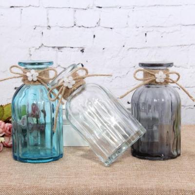 China Household Products Cute Porcelain Vase Air Freshener Bottle Home Clear Nordic Glass Decoration Small For Flower Arrangement Wedding Centerpieces for sale