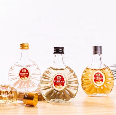 China Beverage Smaller 30ml 50ml High Quality Custom Spirits Vodka Whiskey Cocktail Liquor Glass Bottle Candy Shop Use With Aluminum Cap for sale