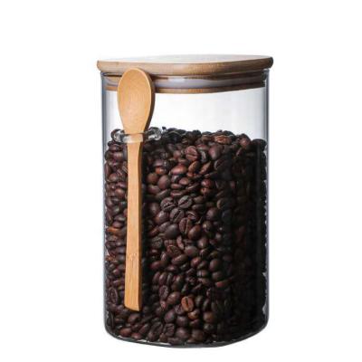 China High quality900ml 1200ml 1400ml square food candy borosilicate glass jar for food storage container with wooden spoon bamboo cover for sale