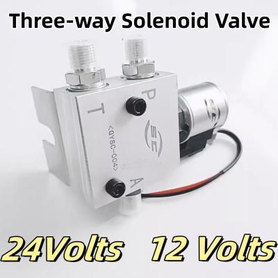 China Válvula de solenoide de tres vías para acoplador de enganche rápido / accesorios de excavadora 24 voltios en venta