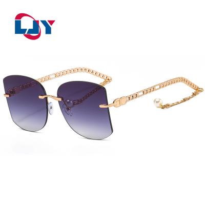 China 2022 Ghain Fashion Sunglasses 2050 Fashion Glass Metal Frameless Belt Bead Dangle Women's Fashion Sunglasses for sale