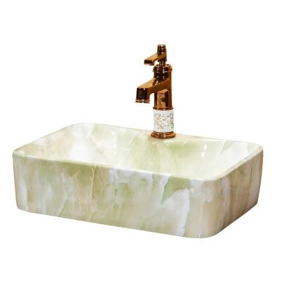 China Easy Clean Modern Artificial Hotel Table Top Molds Cream Wash Marble Basin For Sale for sale