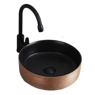 China Low Price Rose Gold Small Size Bathroom Easy Clean Black Wash Sink High Quality Ceramic Basin for sale