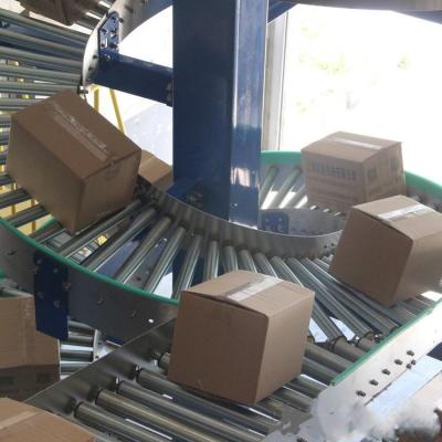 China Heat Resistant No Power Heavy Load Spiral Conveyor Plastic Food BeverageTransfer Conveyor Different Floors Transfer Cardboard en venta