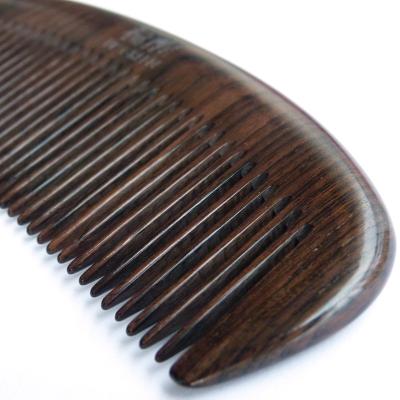 China Comb his whole comb ebony wood comb ebony gift electrostatic light purple authentic real natural anti ebony hair wooden engraving for sale