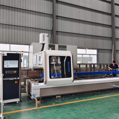 Cina L'alluminio ed il centro di lavorazione di CNC di asse di Upvc 4 con 300mm hanno visto Balde per la perforazione ed il taglio del profilo di alluminio in vendita