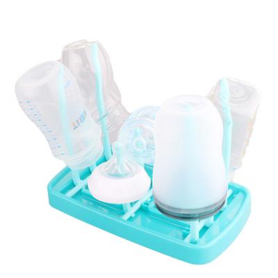 中国 Multifunctional tree dustproof portable foldable Baby plastic bottle dish rack baby bottle drying rack holder 販売のため