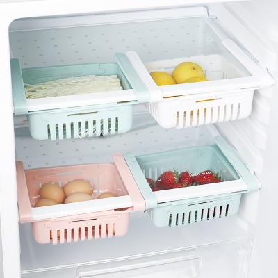 中国 Retractable adjustable Kitchen Plastic Storage refrigerator drawer basket fresh compartment storage rack 販売のため