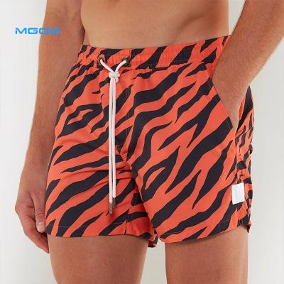 China 2022 Summer Anti-Wrinkle MGOO Men's Anti-Wrinkle Logo Surfing Board Shorts Custom Made Design High Quality Polyester 4 Way Stretch Shorts Recycled for sale