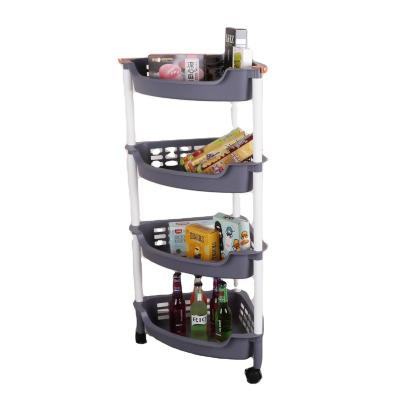 China Multi-Tier Plastic Corner Storage Shelf Floor-standing Stocked Toy Storage Shelf With Wheels for sale