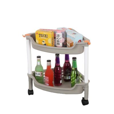 China Modern Large Capacity Kitchen Shelf Floor-standing Triangular Plastic Storage Shelf With Wheels for sale