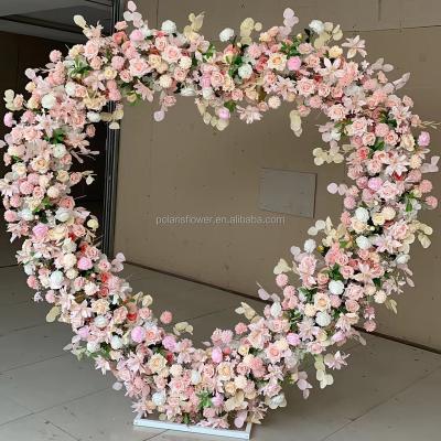 China Latest Wedding Decorations Rose Flower Wall Heart Shaped Backdrop Fashionable Decor For Wedding Backdrop Stage for sale