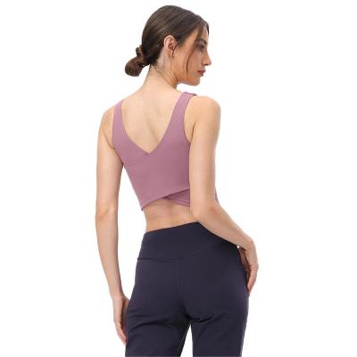 China Shirts & Popular Women's Fitness Top Solid Color U-neck Sports Back Vest Beautiful Built In Bra Strap Halter Fitness Yoga Backless Top for sale