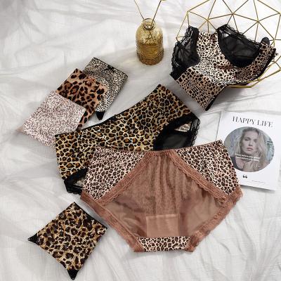 China Antibacterial Ice Silk Printing Women's Underwear Women's Cool Sexy Leopard Lace Mid-Waist Transparent Hot Briefs for sale