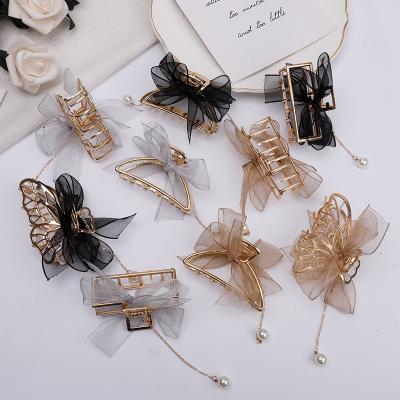 China Wholesale Hair Decoration Jiamu Gold and Silver Metal Claw Clip with Tassel Butterfly Clips Claw Bow Knot Pearl Hair Claw Clips for Women Girls for sale