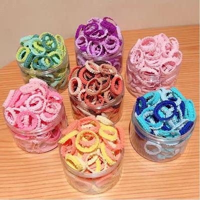 China Hot Selling Jiamu Hair Tie In Running Children L Colorful Ring Women High Stretch Rubber Candy Color Girls Hair Band Band 100pcs/box for sale