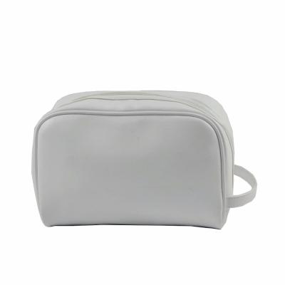 China Competitive price designer travel white toiletry bag leather storage bag leather toiletry cosmetic for sale