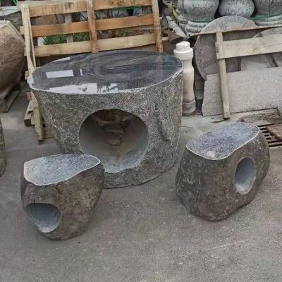 China Chinese Handcrafted Outdoor Decorative Natural Rock Stone Dining Black Boulder Square Table and Solid Bench Stool Set for Garden for sale