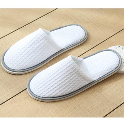 China Anti-slip Top Grade Hotel Waffle Cotton Slipper Custom Design Embroidered Disposable Slippers for sale