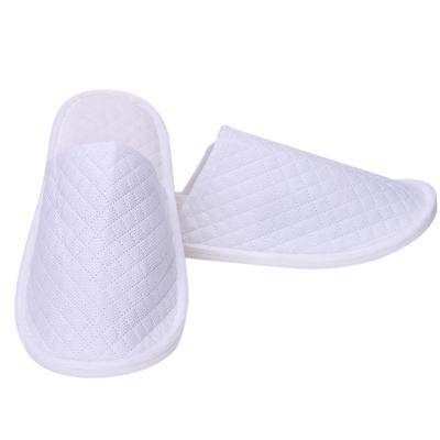 China Cheap Disposable Natural Degradable Non-woven Embossed Hotel Slippers Disposable Slippers Hotel/Spa Hotel/Holiday Resort/Hospital Use Slippers for sale